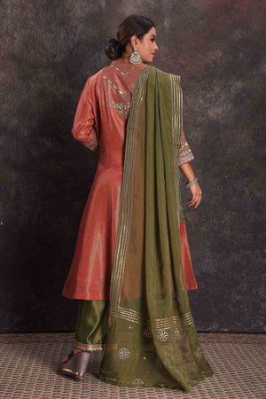 Buy stunning metallic orange embroidered Anarkali suit online in USA with green dupatta. Look your ethnic best on festive occasions with latest designer sarees, pure silk sarees, Kanchipuram silk sarees, designer dresses, Anarkali suits, gown, embroidered sarees from Pure Elegance Indian fashion store in USA.-back