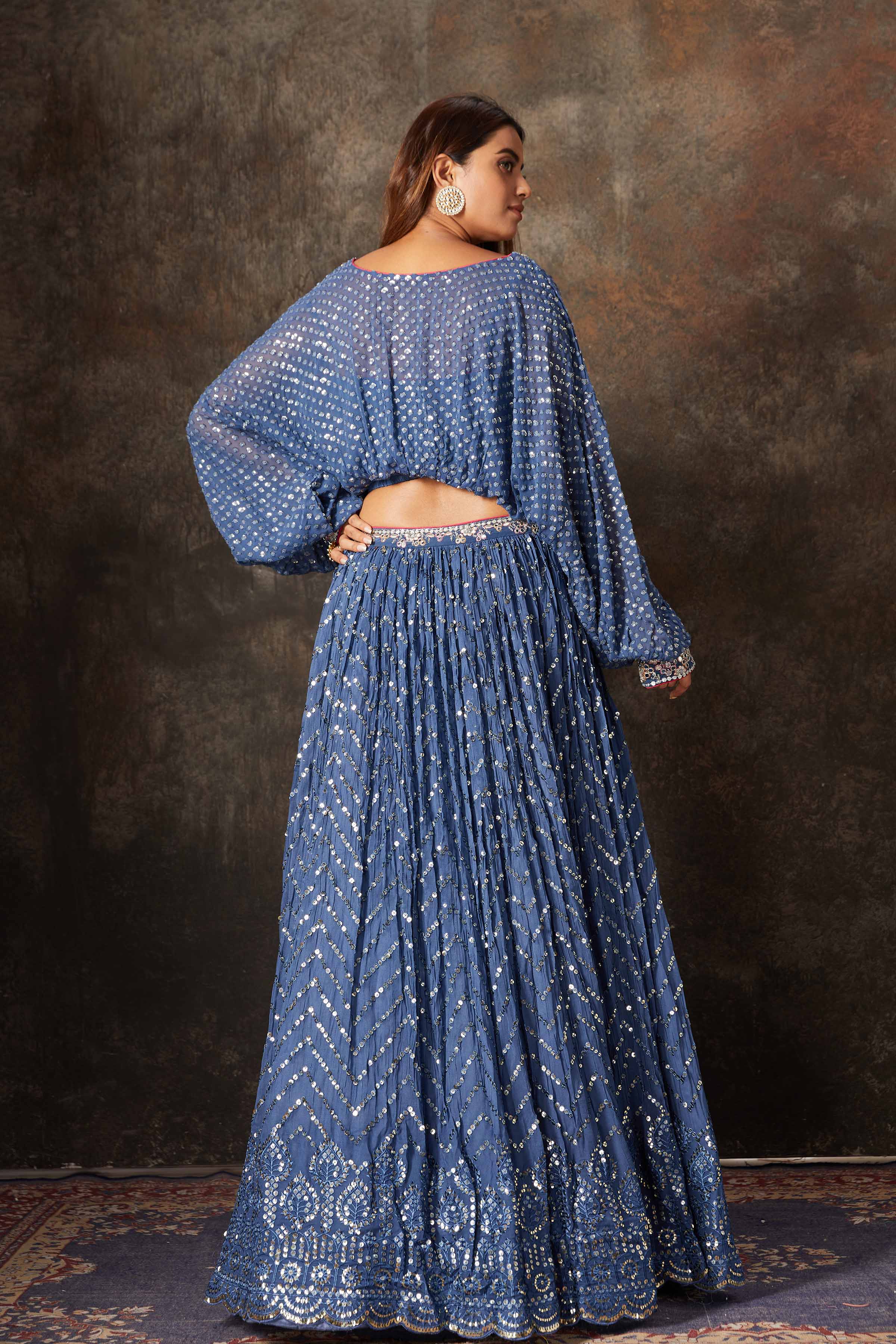 Shop beautiful blue embroidered designer skirt set online in USA. Look stylish at parties and special occasions in beautiful designer sarees, embroidered sarees, handwoven silk, party sarees, lehengas, Anarkali suits from Pure Elegance Indian fashion store in USA.-back