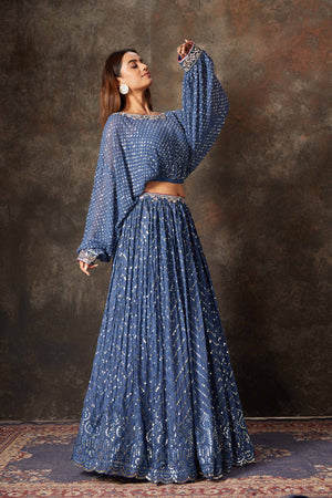 Shop beautiful blue embroidered designer skirt set online in USA. Look stylish at parties and special occasions in beautiful designer sarees, embroidered sarees, handwoven silk, party sarees, lehengas, Anarkali suits from Pure Elegance Indian fashion store in USA.-side