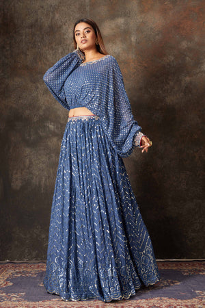 Shop beautiful blue embroidered designer skirt set online in USA. Look stylish at parties and special occasions in beautiful designer sarees, embroidered sarees, handwoven silk, party sarees, lehengas, Anarkali suits from Pure Elegance Indian fashion store in USA.-left side