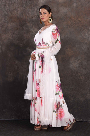 Shop white floral floorlength Anarkali online in USA with dupatta. Be the star of the occasion in this stylish designer lehengas, designer gowns, Indowestern dresses, Anarkali suits, sharara suits from Pure Elegance Indian fashion store in USA.-right