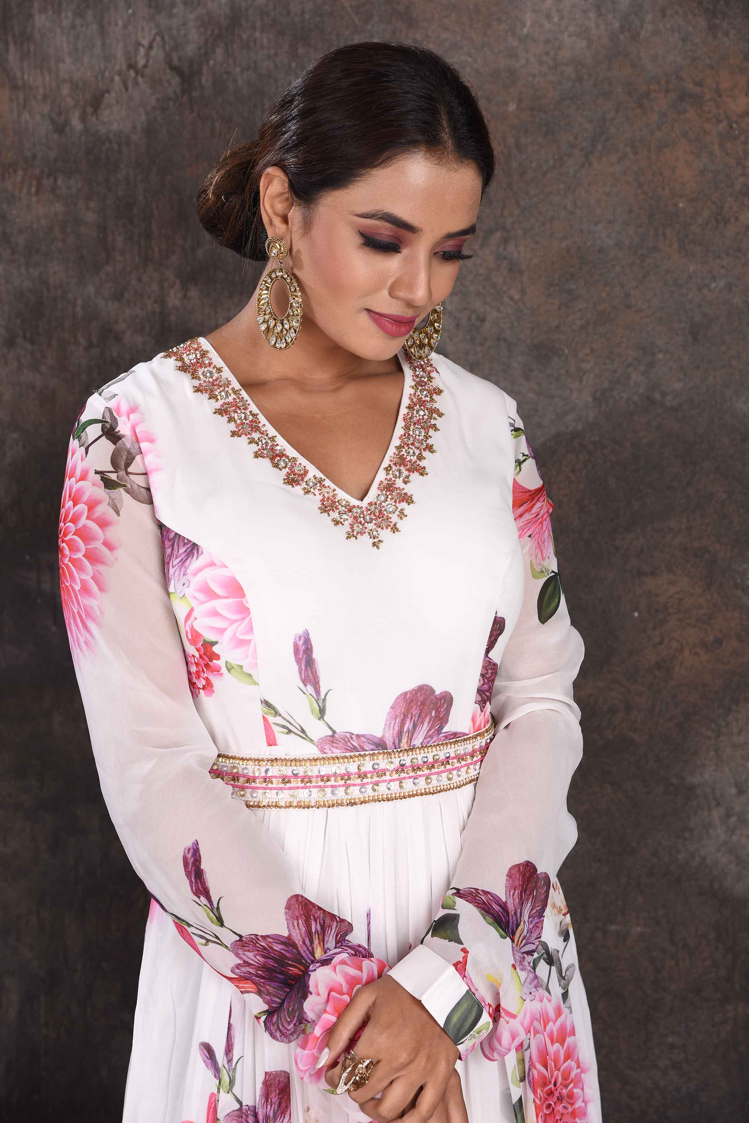 Shop white floral floorlength Anarkali online in USA with dupatta. Be the star of the occasion in this stylish designer lehengas, designer gowns, Indowestern dresses, Anarkali suits, sharara suits from Pure Elegance Indian fashion store in USA.-closeup