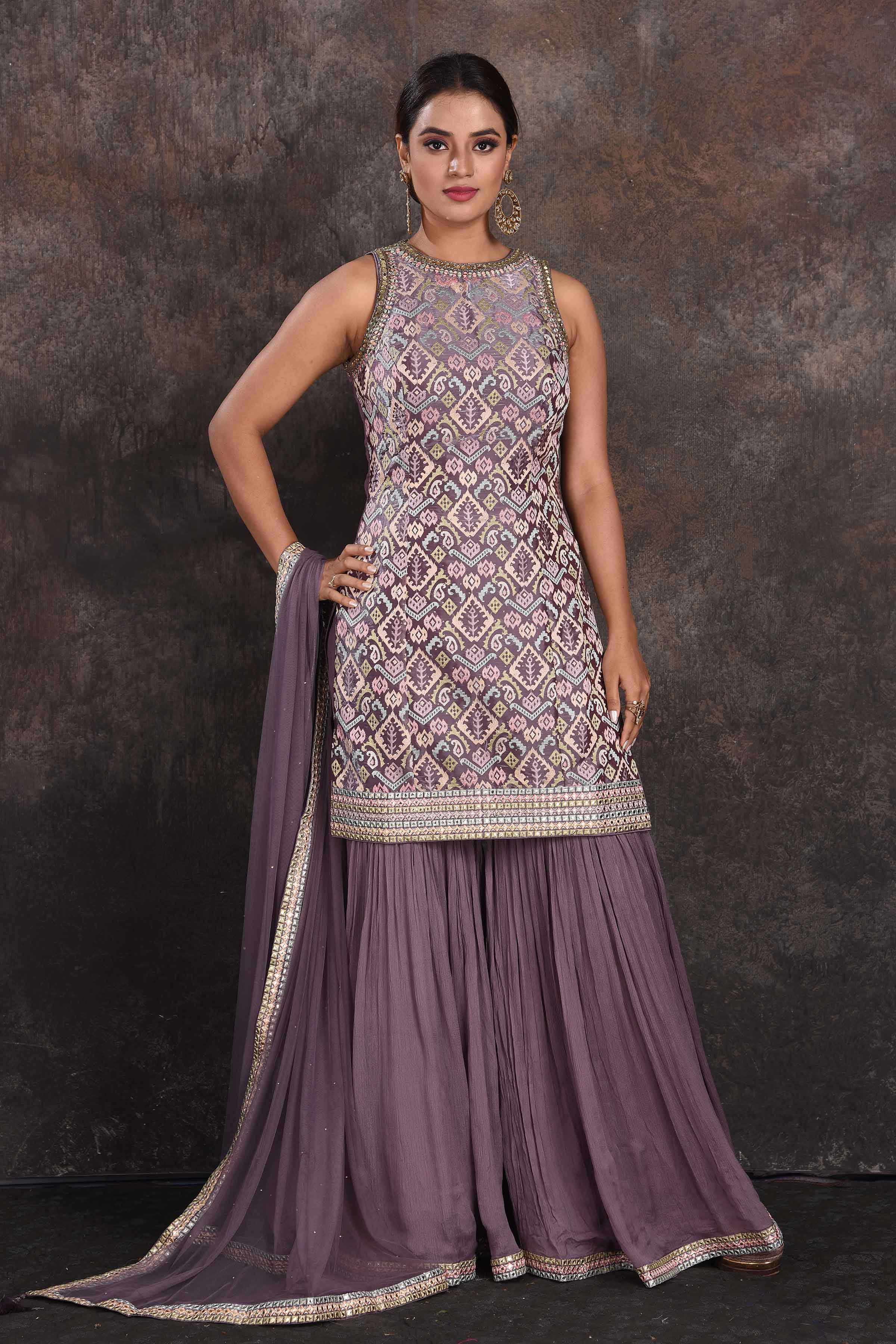 Shop stunning grey embellished designer sharara suit online in USA with dupatta. Be the star of the occasion in this stylish designer lehengas, designer gowns, Indowestern dresses, Anarkali suits, sharara suits from Pure Elegance Indian fashion store in USA.-full view
