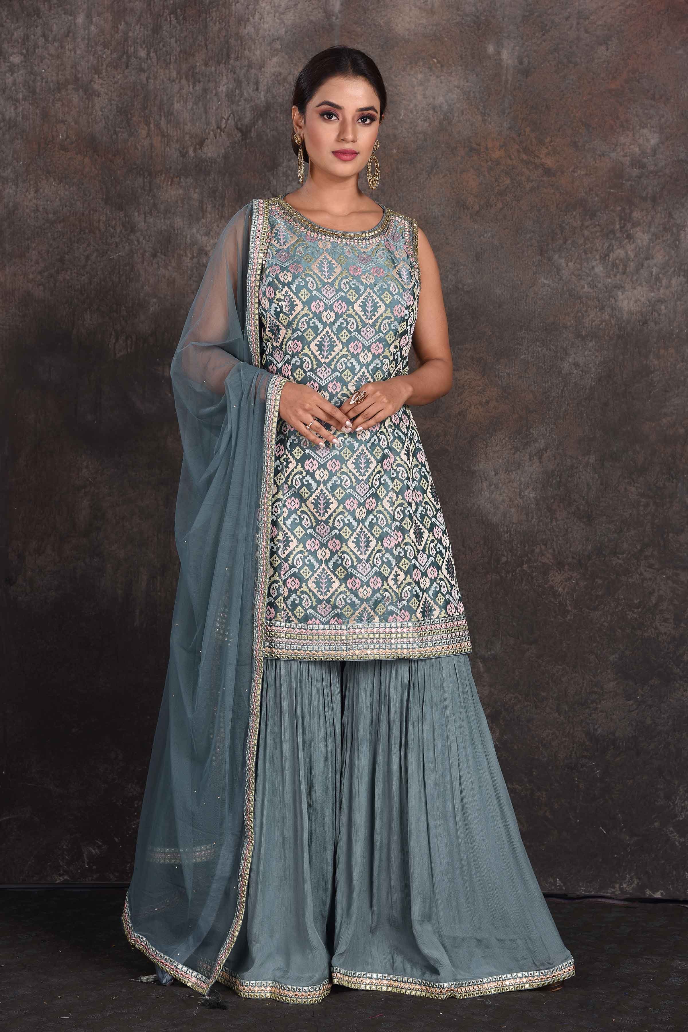 Buy beautiful sage green embellished designer sharara suit online in USA with dupatta. Be the star of the occasion in this stylish designer lehengas, designer gowns, Indowestern dresses, Anarkali suits, sharara suits from Pure Elegance Indian fashion store in USA.-full view