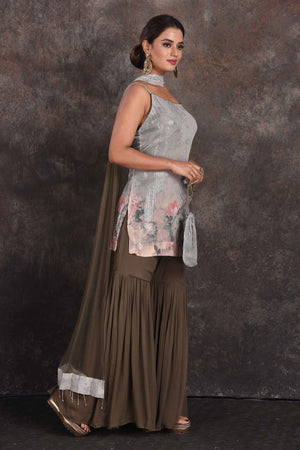 Buy beautiful brown and grey sequin work gharara suit online in USA with dupatta. Be the star of the occasion in this stylish designer lehengas, designer gowns, Indowestern dresses, Anarkali suits, sharara suits from Pure Elegance Indian fashion store in USA.-side