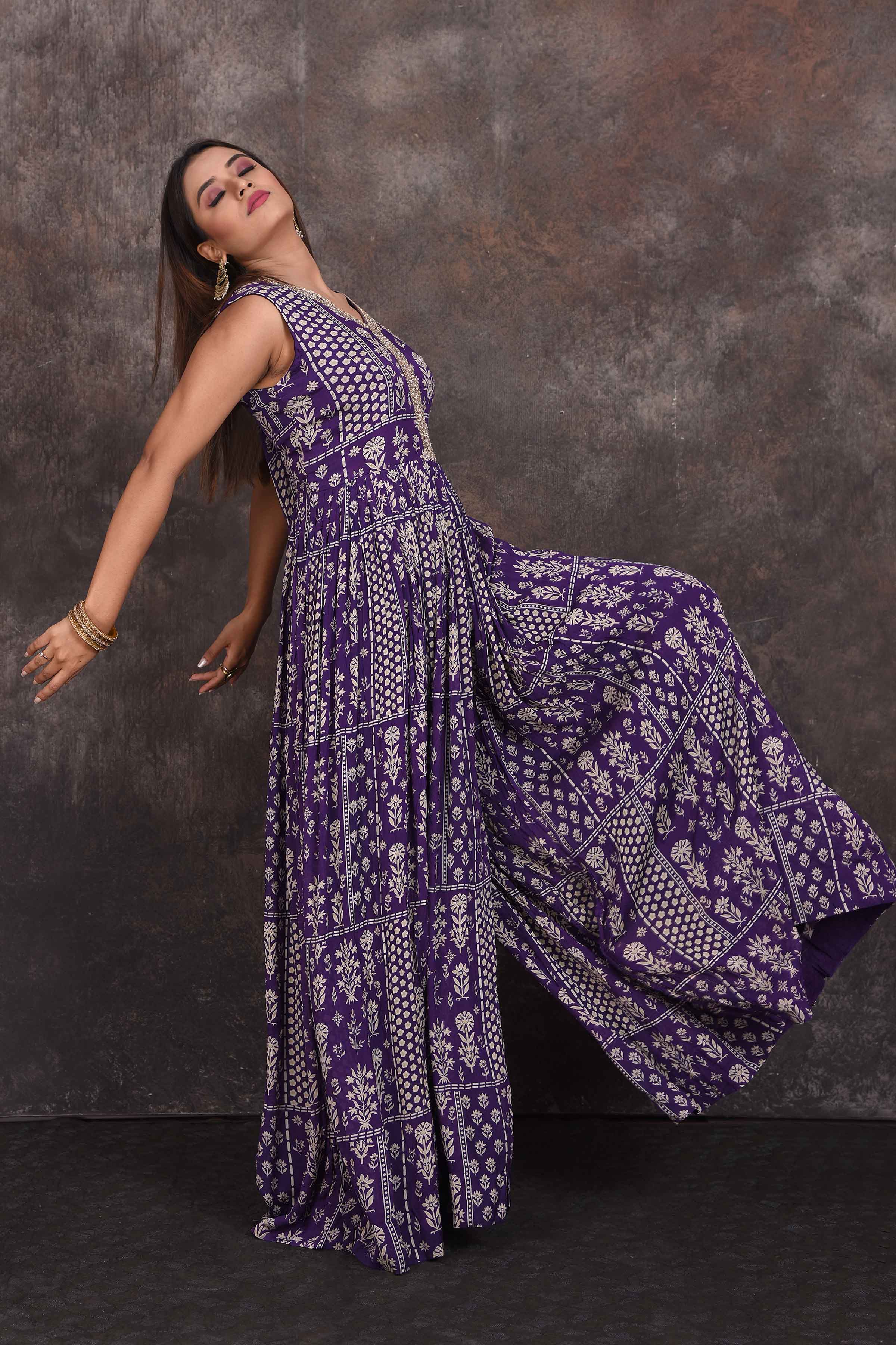 Shop stunning purple printed embellished jumpsuit online in USA. Be the star of the occasion in this stylish designer lehengas, designer gowns, Indowestern dresses, Anarkali suits, sharara suits from Pure Elegance Indian fashion store in USA.-side
