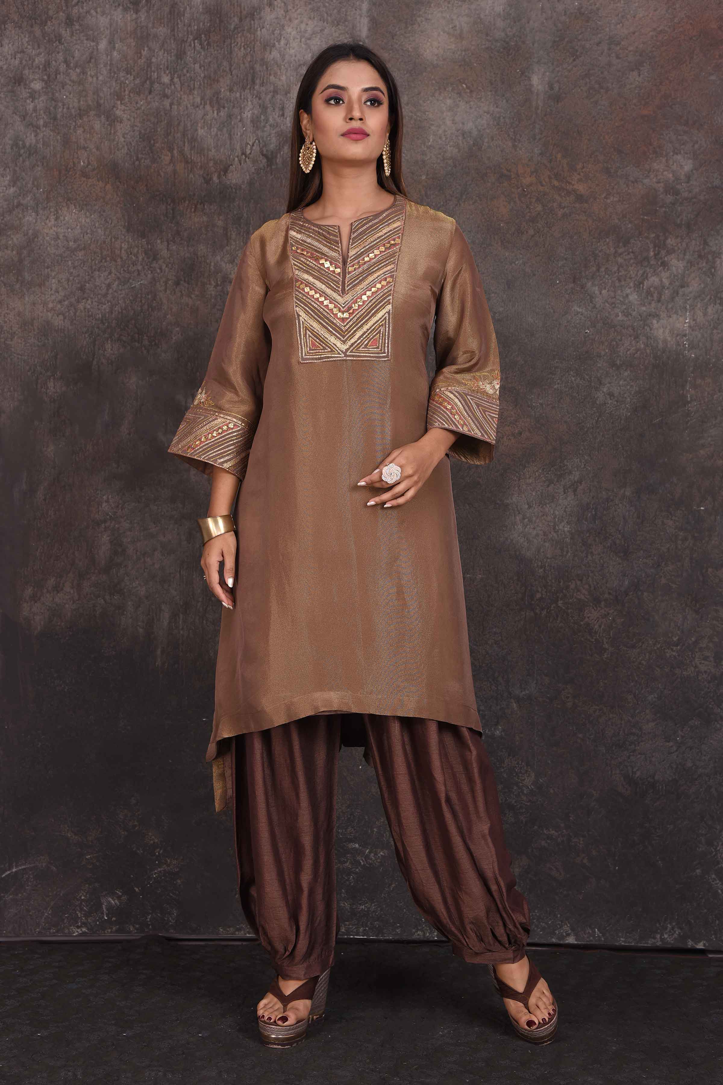 Shop stunning brown emrboidered salwar suit online in USA. Be the star of the occasion in this stylish designer lehengas, designer gowns, Indowestern dresses, Anarkali suits, sharara suits from Pure Elegance Indian fashion store in USA.-front