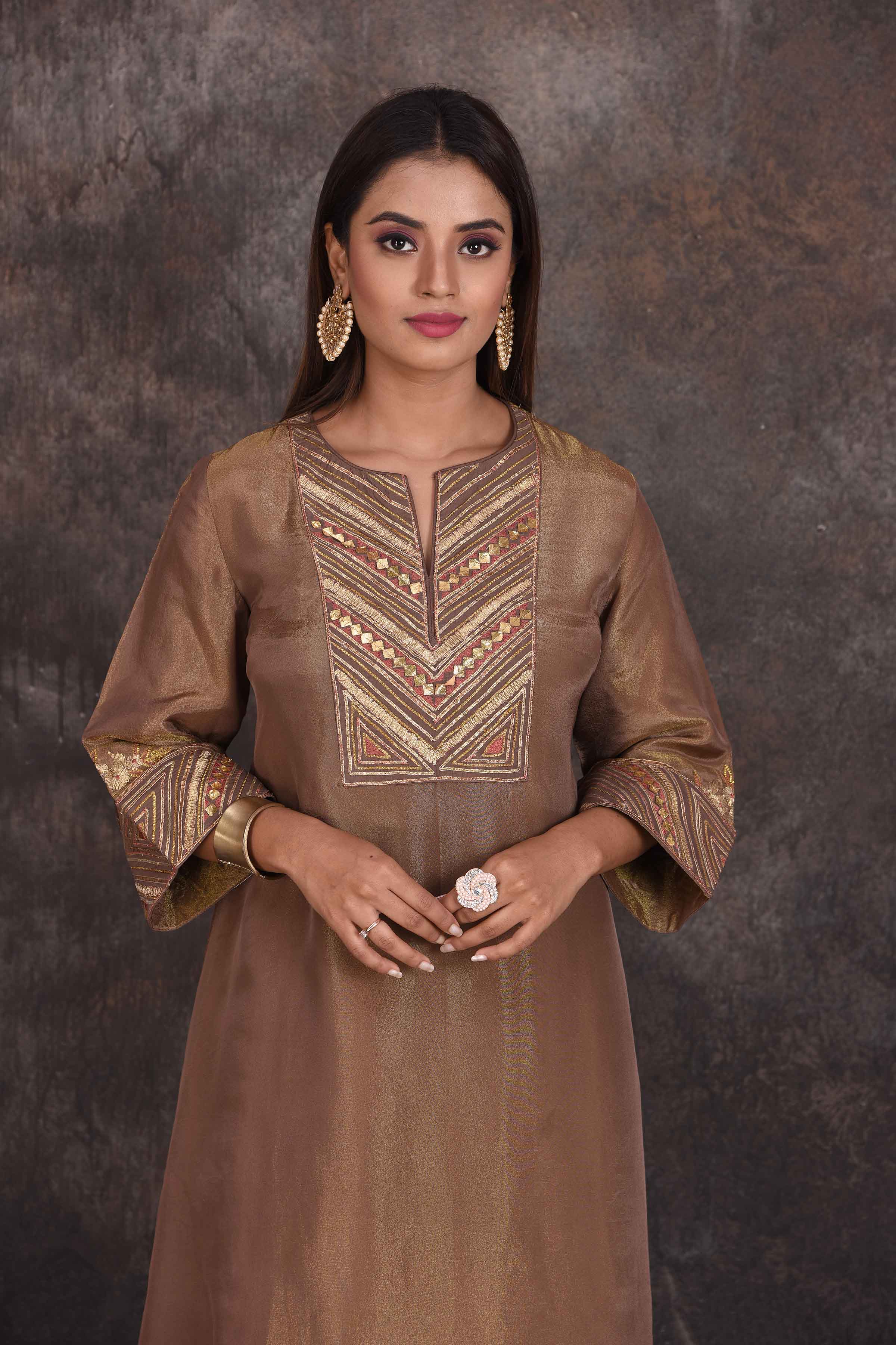 Shop stunning brown emrboidered salwar suit online in USA. Be the star of the occasion in this stylish designer lehengas, designer gowns, Indowestern dresses, Anarkali suits, sharara suits from Pure Elegance Indian fashion store in USA.-closeup