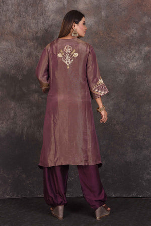Buy beautiful golden purple embroidered salwar suit online in USA. Be the star of the occasion in this stylish designer lehengas, designer gowns, Indowestern dresses, Anarkali suits, sharara suits from Pure Elegance Indian fashion store in USA.-back