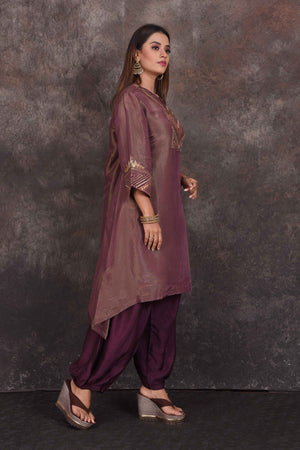 Buy beautiful golden purple embroidered salwar suit online in USA. Be the star of the occasion in this stylish designer lehengas, designer gowns, Indowestern dresses, Anarkali suits, sharara suits from Pure Elegance Indian fashion store in USA.-right