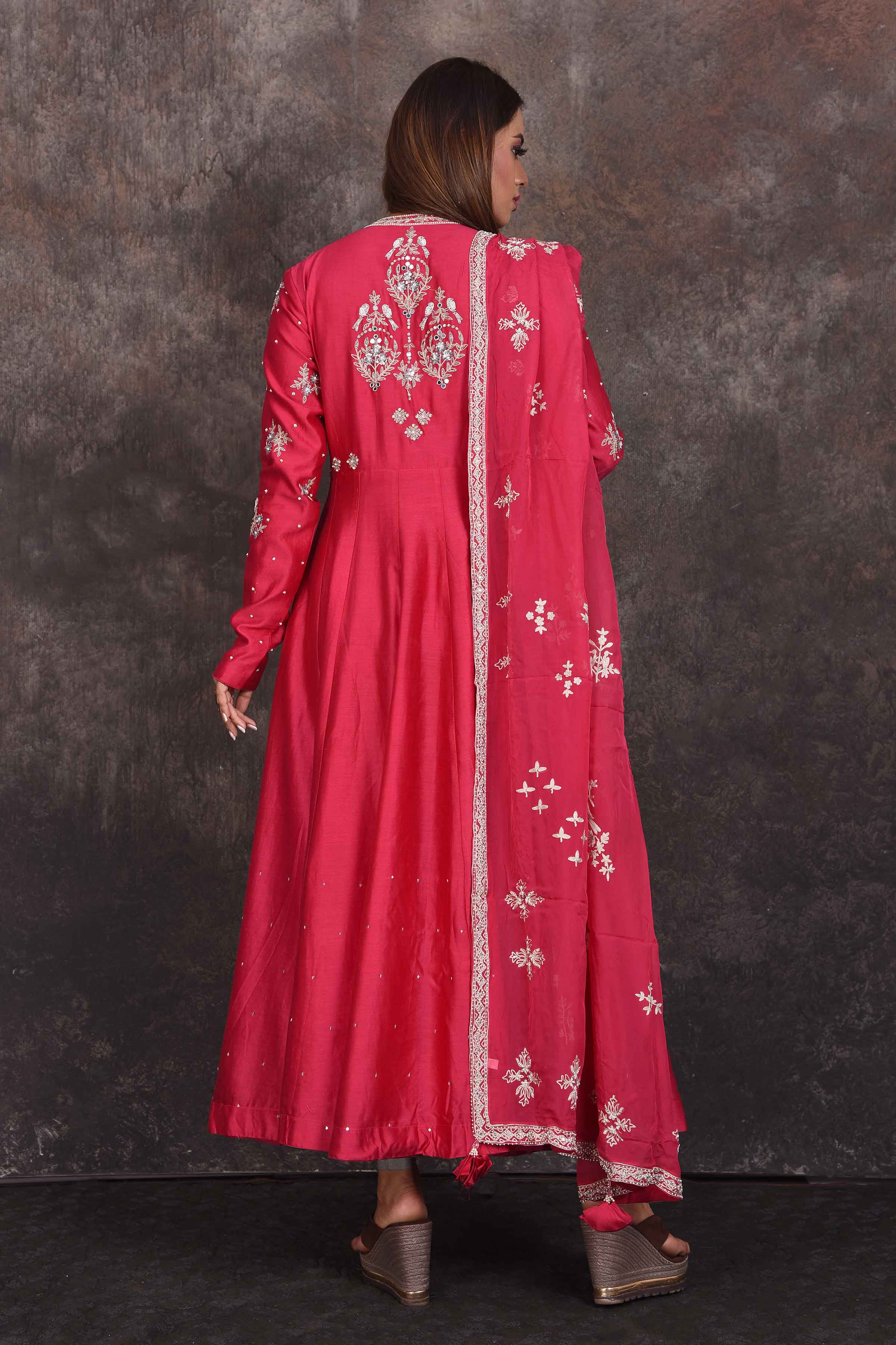 Shop bright pink embroidered Anarkali suit online in USA with dupatta. Be the star of the occasion in this stylish designer lehengas, designer gowns, Indowestern dresses, Anarkali suits, sharara suits from Pure Elegance Indian fashion store in USA.-back