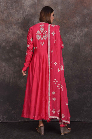 Shop bright pink embroidered Anarkali suit online in USA with dupatta. Be the star of the occasion in this stylish designer lehengas, designer gowns, Indowestern dresses, Anarkali suits, sharara suits from Pure Elegance Indian fashion store in USA.-back