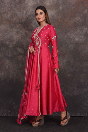 Shop bright pink embroidered Anarkali suit online in USA with dupatta. Be the star of the occasion in this stylish designer lehengas, designer gowns, Indowestern dresses, Anarkali suits, sharara suits from Pure Elegance Indian fashion store in USA.-side
