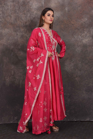 Shop bright pink embroidered Anarkali suit online in USA with dupatta. Be the star of the occasion in this stylish designer lehengas, designer gowns, Indowestern dresses, Anarkali suits, sharara suits from Pure Elegance Indian fashion store in USA.-right
