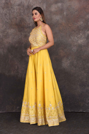 Buy stunning yellow embroidered halter neck jumpsuit online in USA. Be the star of the occasion in this stylish designer lehengas, designer gowns, Indowestern dresses, Anarkali suits, sharara suits from Pure Elegance Indian fashion store in USA.-side