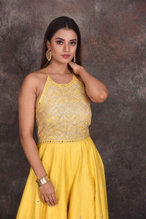 Buy stunning yellow embroidered halter neck jumpsuit online in USA. Be the star of the occasion in this stylish designer lehengas, designer gowns, Indowestern dresses, Anarkali suits, sharara suits from Pure Elegance Indian fashion store in USA.-closeup