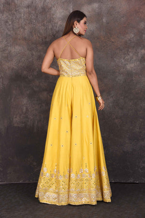 Buy stunning yellow embroidered halter neck jumpsuit online in USA. Be the star of the occasion in this stylish designer lehengas, designer gowns, Indowestern dresses, Anarkali suits, sharara suits from Pure Elegance Indian fashion store in USA.-back