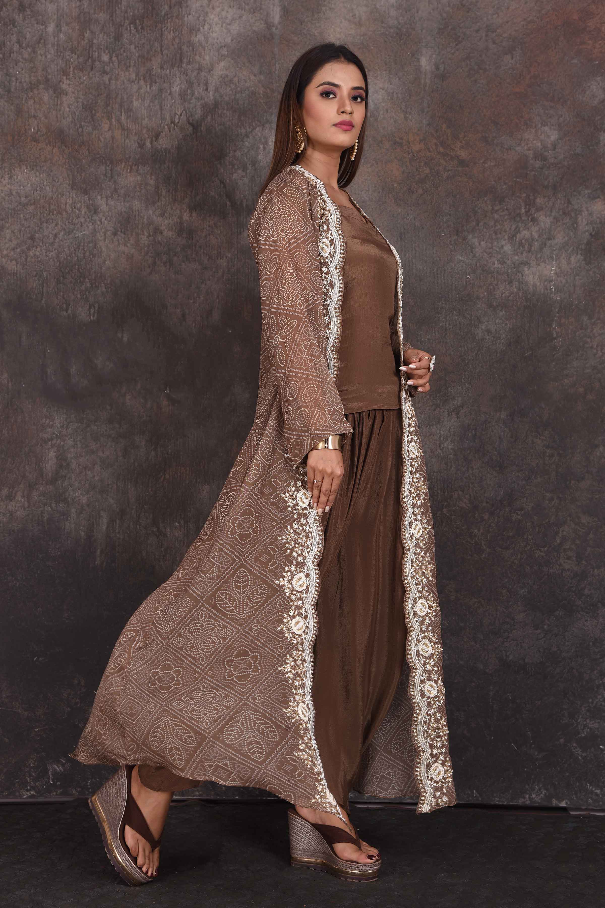 Buy beautiful brown salwar suit online in USA with embroidered jacket. Be the star of the occasion in this stylish designer lehengas, designer gowns, Indowestern dresses, Anarkali suits, sharara suits from Pure Elegance Indian fashion store in USA.-side