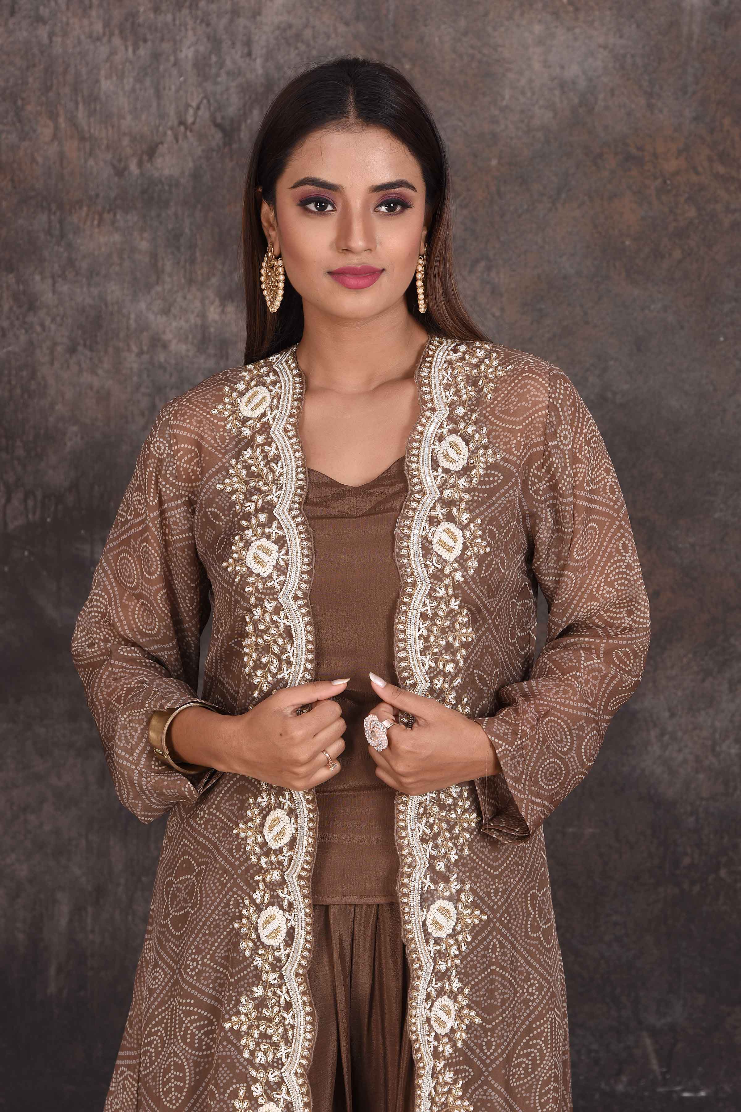 Buy beautiful brown salwar suit online in USA with embroidered jacket. Be the star of the occasion in this stylish designer lehengas, designer gowns, Indowestern dresses, Anarkali suits, sharara suits from Pure Elegance Indian fashion store in USA.-closeup