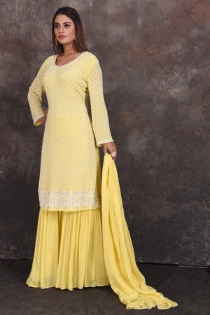 Shop beautiful lemon yellow embroidered sharara suit online in USA with dupatta. Be the star of the occasion in this stylish designer lehengas, designer gowns, Indowestern dresses, Anarkali suits, sharara suits from Pure Elegance Indian fashion store in USA.-dupatta