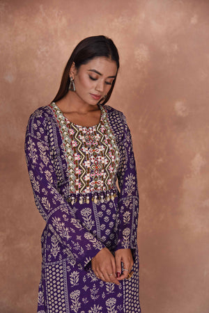 Shop purple printed and embroidered sharara suit online in USA with dupatta. Dazzle on weddings and special occasions with exquisite Indian designer dresses, embroidered sarees, partywear sarees, Bollywood sarees, handloom sarees, designer lehenga, Anarkali suits from Pure Elegance Indian clothing store in USA.-closeup