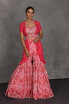 Shop pink printed sharara suit online in USA with shrug and belt. Flaunt your Indian style on festive occasions in stunning designer lehengas, Anarkali suit, sharara suits, designer gowns, designer sarees, embroidered sarees from Pure Elegance India fashion store in USA. -full view