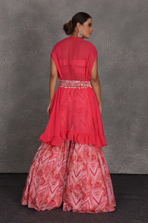 Shop pink printed sharara suit online in USA with shrug and belt. Flaunt your Indian style on festive occasions in stunning designer lehengas, Anarkali suit, sharara suits, designer gowns, designer sarees, embroidered sarees from Pure Elegance India fashion store in USA. -back