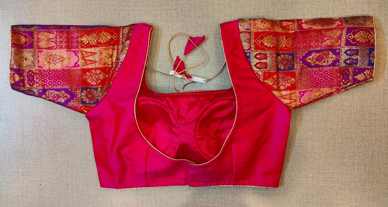 Shop stunning pink saree blouse online in USA with Banarasi sleeves. Elevate your Indian saree style with exquisite readymade sari blouse, embroidered saree blouses, Banarasi saree blouse, designer sari blouse, choli-cut blouses from Pure Elegance Indian clothing store in USA.-back