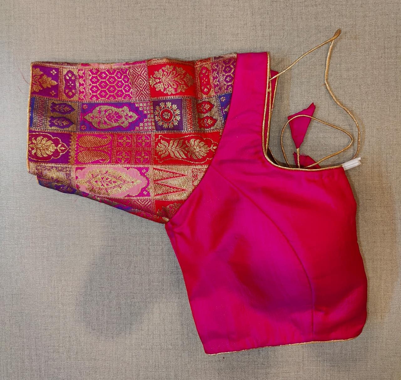 Shop stunning pink saree blouse online in USA with Banarasi sleeves. Elevate your Indian saree style with exquisite readymade sari blouse, embroidered saree blouses, Banarasi saree blouse, designer sari blouse, choli-cut blouses from Pure Elegance Indian clothing store in USA.-side