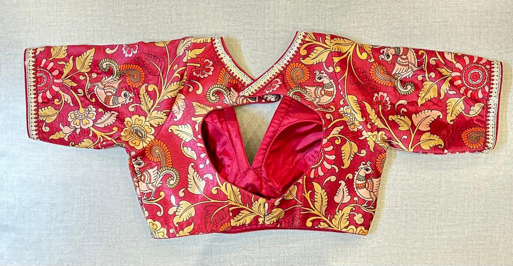 Buy blood red Kalamkari saree blouse online in USA with sequin lace. Elevate your saree style with exquisite readymade saree blouses, embroidered saree blouses, Banarasi saree blouse, designer saree blouse, choli-cut blouses, corset blouses from Pure Elegance Indian clothing store in USA.-back