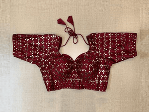 Shop beautiful maroon mirror work choli-cut saree blouse online in USA. Elevate your saree style with exquisite readymade saree blouses, embroidered saree blouses, Banarasi saree blouse, designer saree blouse, choli-cut blouses, corset blouses from Pure Elegance Indian clothing store in USA.-full view