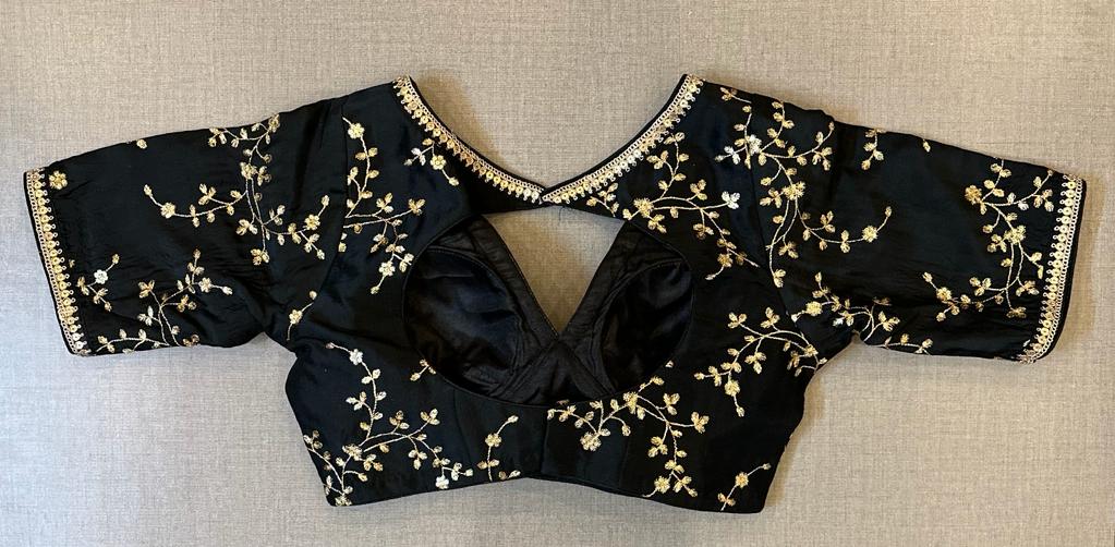 Buy black embroidered saree blouse online in USA with V-neck. Elevate your saree style with exquisite readymade saree blouses, embroidered saree blouses, Banarasi saree blouse, designer saree blouse, choli-cut blouses, corset blouses from Pure Elegance Indian clothing store in USA.-back