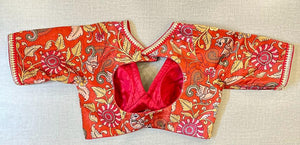 Buy beautiful bright red Kalamkari saree blouse online in USA with sequin lace. Elevate your saree style with exquisite readymade saree blouses, embroidered saree blouses, Banarasi saree blouse, designer saree blouse, choli-cut blouses, corset blouses from Pure Elegance Indian clothing store in USA.-back