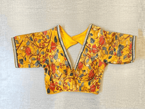 Shop beautiful yellow Kalamkari saree blouse online in USA with sequin lace. Elevate your saree style with exquisite readymade saree blouses, embroidered saree blouses, Banarasi saree blouse, designer saree blouse, choli-cut blouses, corset blouses from Pure Elegance Indian clothing store in USA.-full view