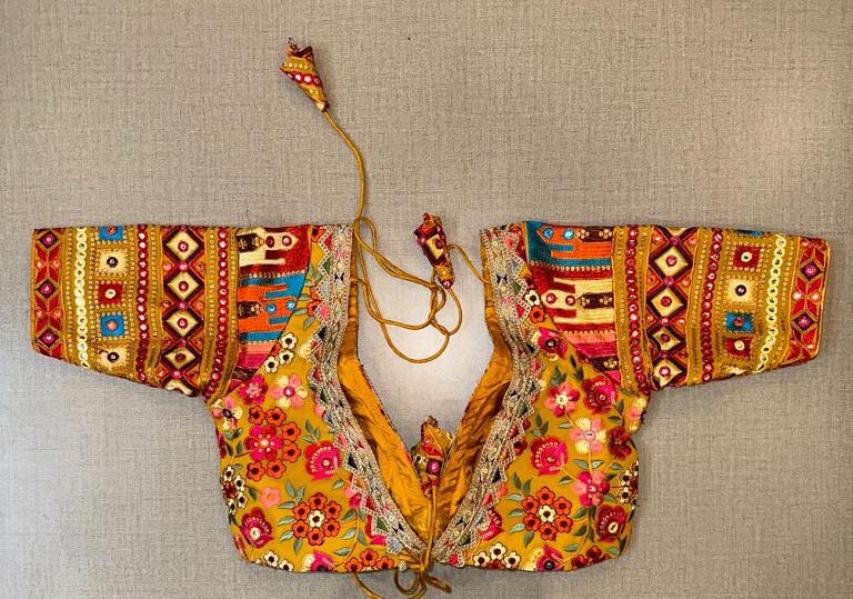 Buy beautiful mustard mirror and multicolor thread embroidery saree blouse online in USA. Elevate your saree style with exquisite readymade saree blouses, embroidered saree blouses, Banarasi saree blouse, designer saree blouse, choli-cut blouses, corset blouses from Pure Elegance Indian clothing store in USA.-back