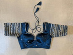 Buy beautiful dark blue designer saree blouse online in USA with silver embroidery. Elevate your saree style with exquisite readymade saree blouses, embroidered saree blouses, Banarasi saree blouse, designer saree blouse, choli-cut blouses, corset blouses from Pure Elegance Indian clothing store in USA.-full view