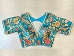 Shop blue Kalamkari saree blouse online in USA with sequin lace. Elevate your saree style with exquisite readymade saree blouses, embroidered saree blouses, Banarasi saree blouse, designer saree blouse, choli-cut blouses, corset blouses from Pure Elegance Indian clothing store in USA.-full view