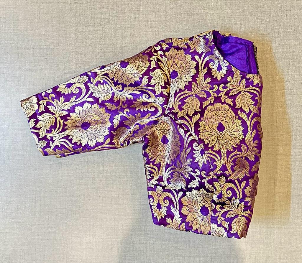 Shop beautiful purple Banarasi saree blouse online in USA. Elevate your saree style with exquisite readymade saree blouses, embroidered saree blouses, Banarasi saree blouse, designer saree blouse, choli-cut blouses, corset blouses from Pure Elegance Indian clothing store in USA.-sleeves