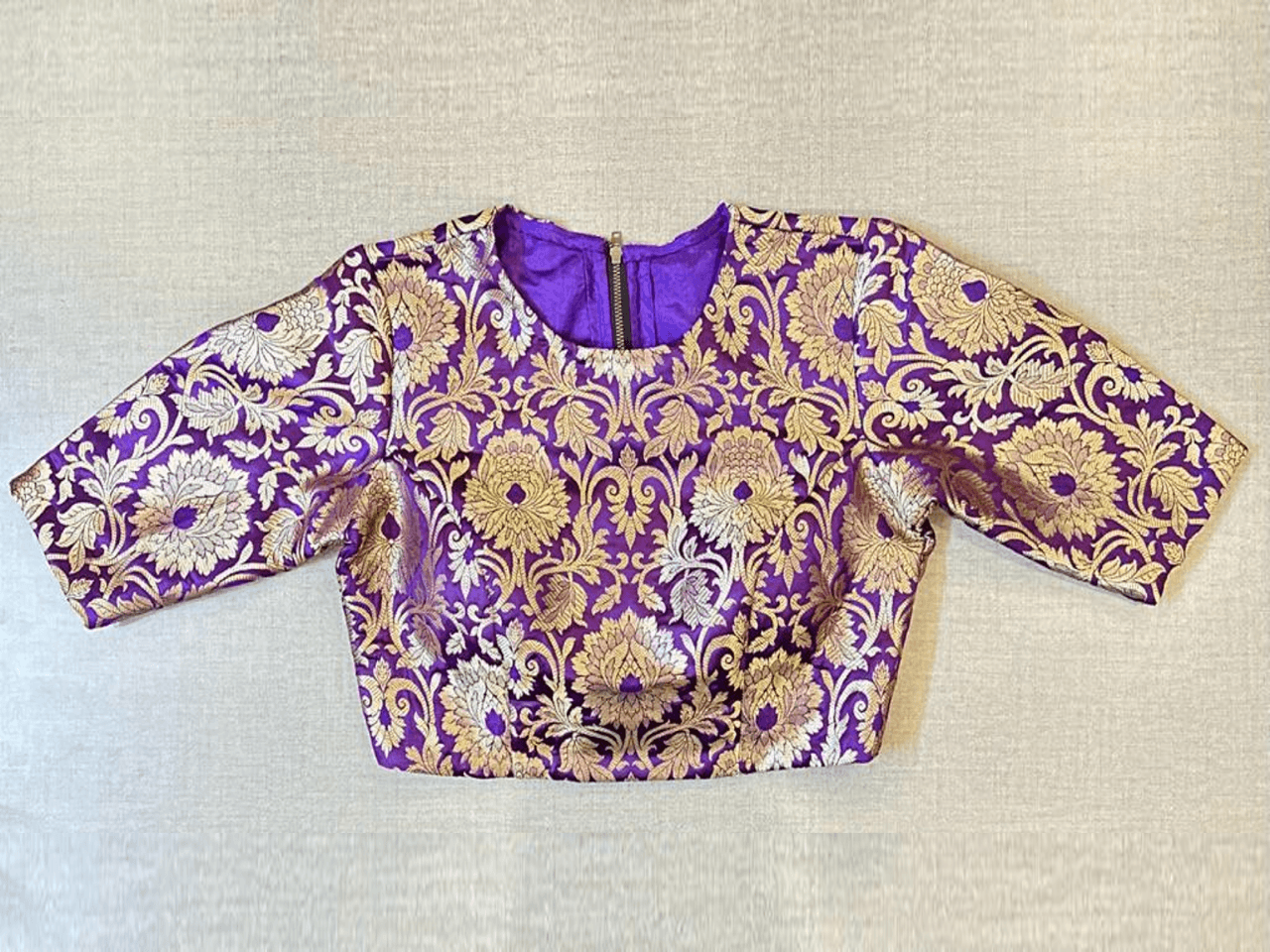 Shop beautiful purple Banarasi saree blouse online in USA. Elevate your saree style with exquisite readymade saree blouses, embroidered saree blouses, Banarasi saree blouse, designer saree blouse, choli-cut blouses, corset blouses from Pure Elegance Indian clothing store in USA.-full view