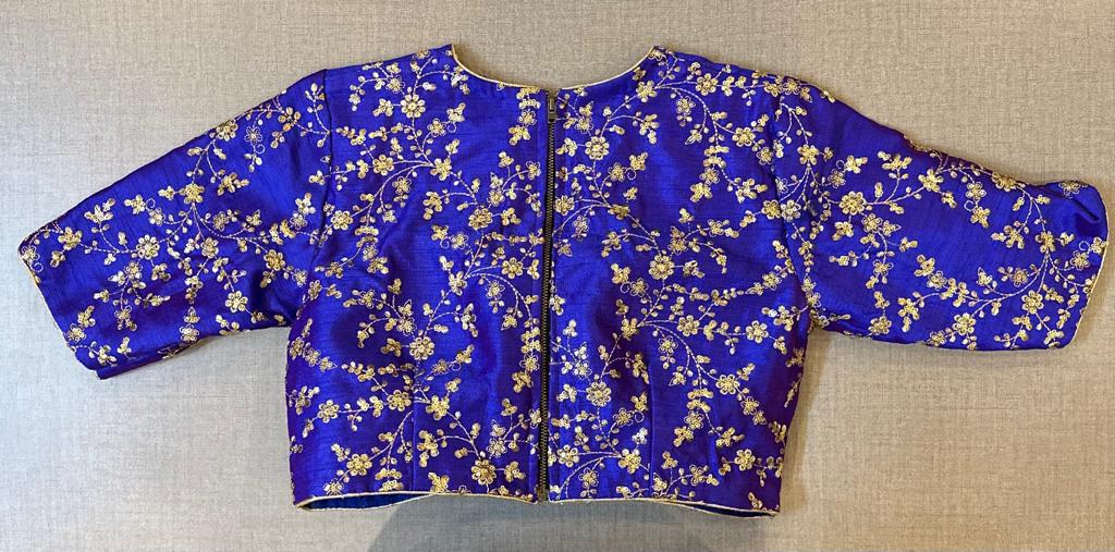 Buy beautiful royal blue saree blouse online in USA with golden embroidery. Elevate your saree style with exquisite readymade saree blouses, embroidered saree blouses, Banarasi saree blouse, designer saree blouse, choli-cut blouses, corset blouses from Pure Elegance Indian clothing store in USA.-back