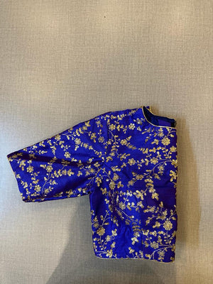 Buy beautiful royal blue saree blouse online in USA with golden embroidery. Elevate your saree style with exquisite readymade saree blouses, embroidered saree blouses, Banarasi saree blouse, designer saree blouse, choli-cut blouses, corset blouses from Pure Elegance Indian clothing store in USA.-sleeves