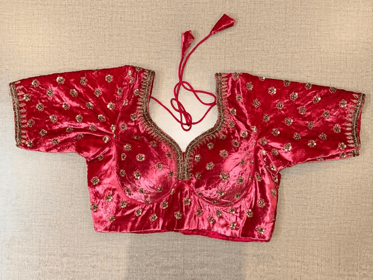 Buy beautiful dark pink embroidered velvet choli cut saree blouse online in USA. Elevate your saree style with exquisite readymade saree blouses, embroidered saree blouses, Banarasi saree blouse, designer saree blouse, choli-cut blouses, corset blouses from Pure Elegance Indian clothing store in USA.-full view