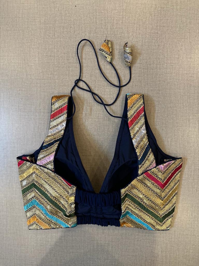 Buy navy blue and golden embroidery sleeveless saree blouse online in USA. Elevate your saree style with exquisite readymade saree blouses, embroidered saree blouses, Banarasi saree blouse, designer saree blouse, choli-cut blouses, corset blouses from Pure Elegance Indian clothing store in USA.-back