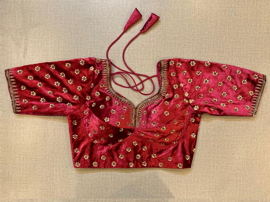 Buy maroon velvet embroidered choli-cut saree blouse online in USA. Elevate your saree style with exquisite readymade saree blouses, embroidered saree blouses, Banarasi sari blouse, designer saree blouse, choli-cut blouse, corset blouses from Pure Elegance Indian fashion store in USA.-full view