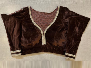 Shop coffee brown velvet saree blouse online in USA with sheer back. Elevate your saree style with exquisite readymade saree blouses, embroidered saree blouses, Banarasi sari blouse, designer saree blouse, choli-cut blouse, corset blouses from Pure Elegance Indian fashion store in USA.-full view