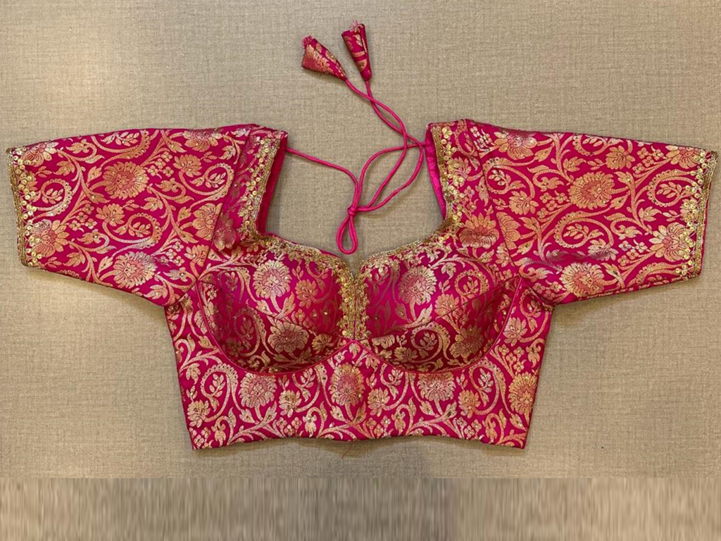 Buy rani pink Banarasi saree blouse online in USA with sequin lace. Elevate your saree style with exquisite readymade saree blouses, embroidered saree blouses, Banarasi sari blouse, designer saree blouse, choli-cut blouse, corset blouses from Pure Elegance Indian fashion store in USA.-full view