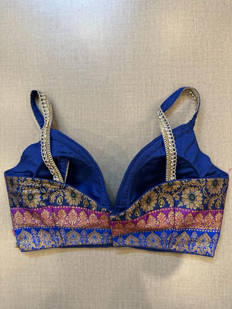 Buy blue and purple Banarasi saree blouse online in USA with mirror lace. Elevate your saree style with exquisite readymade saree blouses, embroidered saree blouses, Banarasi sari blouse, designer saree blouse, choli-cut blouse, corset blouses from Pure Elegance Indian fashion store in USA.-back
