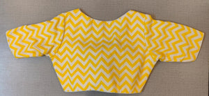 Buy this blouse as a rich add-on to glam up your look. The blouse features a yellow-white wavy line, a 3/4th blouse, and a tie-up closure at back. Team this blouse with a lovely solid saree to look gorgeous and create a stunning and beautiful look. Buy this designer blouse in the USA from Pure Elegance. - Back View