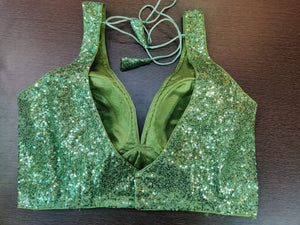 Buy stunning green sequin work sleeveless saree blouse online in USA. Elevate your Indian saree style with exquisite readymade sari blouse, embroidered saree blouses, Banarasi sari blouse, designer sari blouse from Pure Elegance Indian clothing store in USA.- back