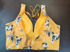 Shop stunning yellow floral readymade sleeveless saree blouse online in USA. Elevate your Indian saree style with exquisite readymade sari blouse, embroidered saree blouses, Banarasi saree blouse, designer saree blouse from Pure Elegance Indian clothing store in USA.-back